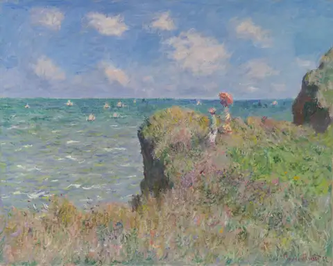 Two people on a grassy cliff over a bright green sea, with sailboats and summer clouds.