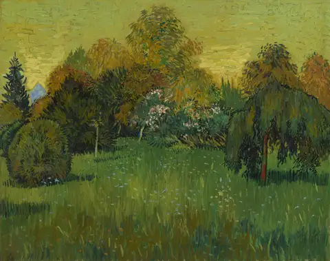 A sunny public garden with a wide lawn, round bushes and tall trees under a yellow sky.